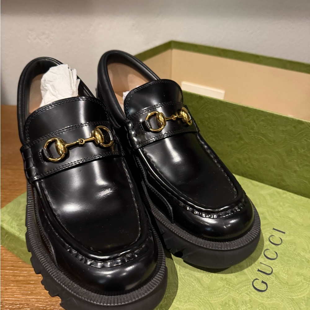 GUCCI
Lug-sole Horsebit loafers